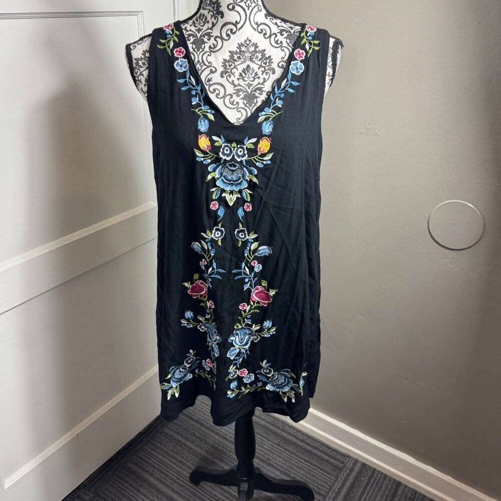 The Cove black v-neck embroidered sleeveless mini dress.  Boho casual